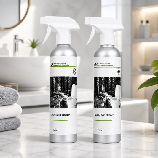 Two bottles of oxalic acid cleaner on a bathroom counter.
